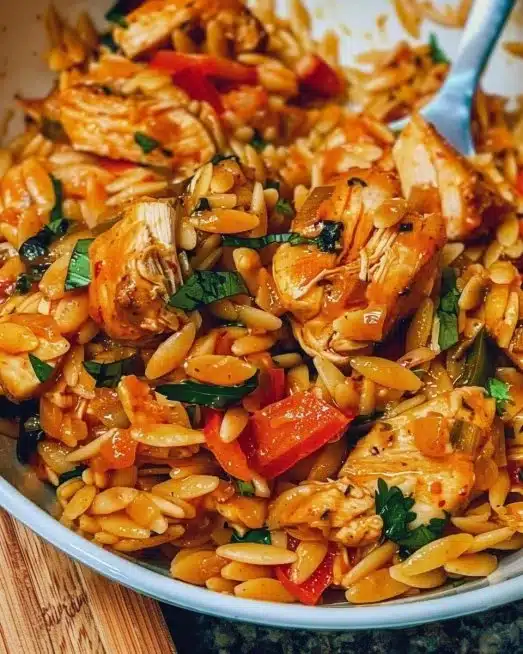 Delicious Cajun Chicken Orzo dish served in a bowl with vibrant colors