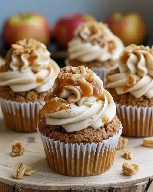Delicious Apple Crisp Cupcakes with cinnamon and apple topping decoration