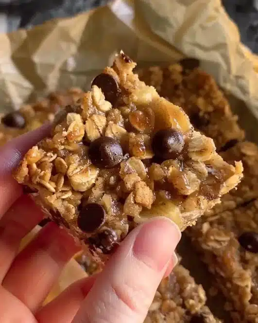 Healthy homemade Banana Oatmeal Bars on a plate with a garnishing