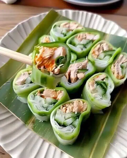 Buffalo Chicken Cucumber Rolls served on a platter for a healthy appetizer.