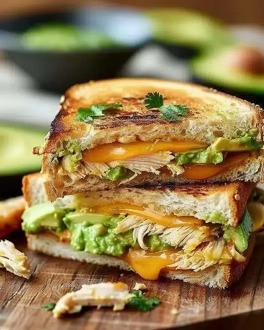 Delicious Chicken Avocado Melt sandwich with chicken, avocado, and melted cheese.