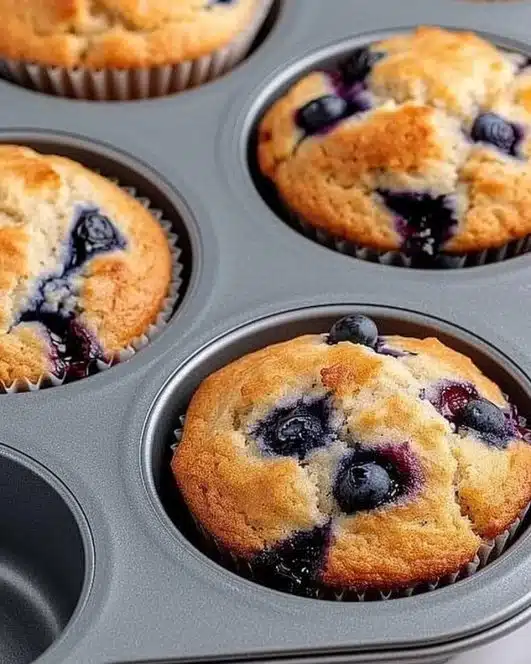 Delicious homemade blueberry protein muffins fresh out of the oven