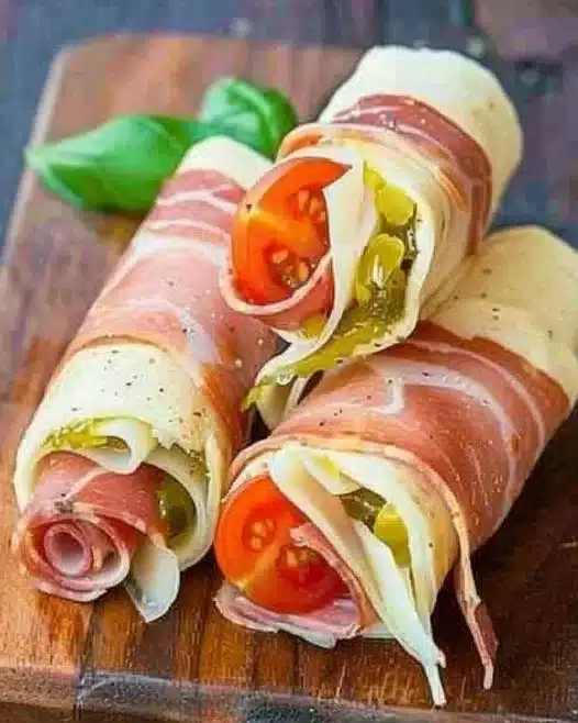 Italian Sub Roll-Ups with deli meats, cheese, and fresh veggies wrapped in a tortilla