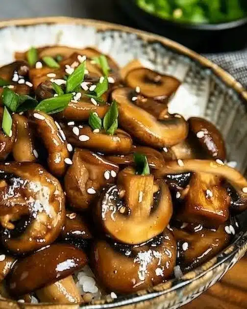 Plate of Japanese miso mushrooms garnished with green onions
