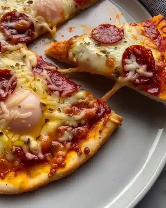 Delicious Pizza Eggs recipe featuring savory toppings and egg goodness.