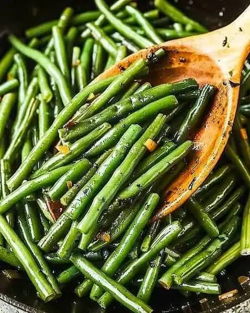 Delicious sautéed green beans made with five simple ingredients.