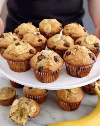 Delicious vegan banana muffins on a wooden table, perfect for a healthy snack.
