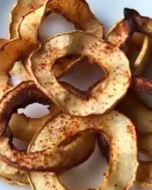 Delicious air fryer apple chips ready to be enjoyed as a healthy snack.