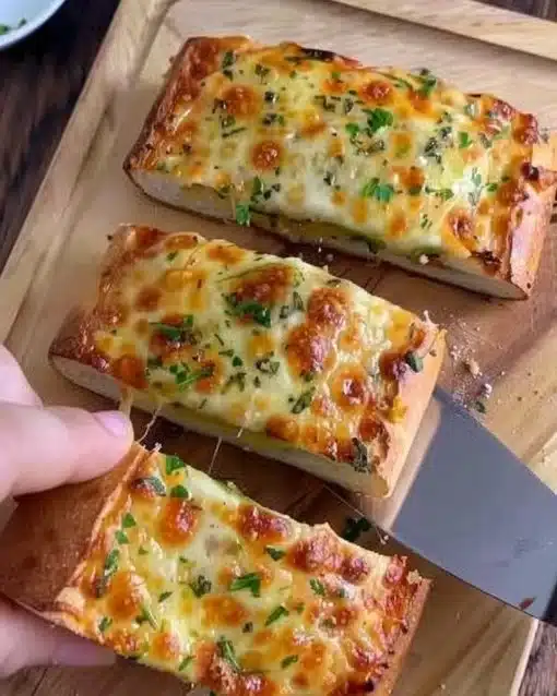 Air fryer pizza baguettes topped with cheese and pepperoni
