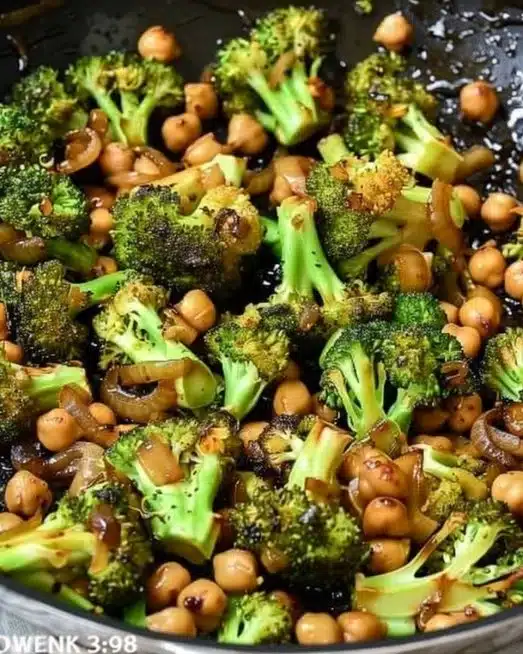 Broccoli stir fry with chickpeas served in a vibrant dish.