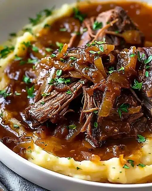 Juicy French Onion Pot Roast with caramelized onions and herbs