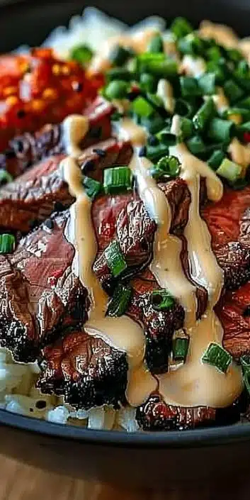 Korean BBQ Steak Rice Bowl with marinated beef and fresh vegetables served over rice