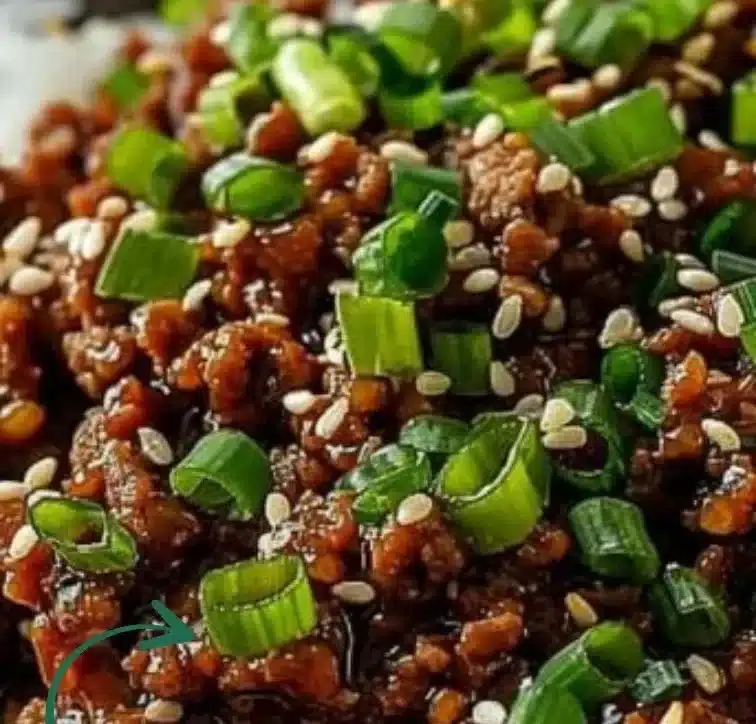 Delicious Korean Ground Beef Bowl topped with green onions and sesame seeds