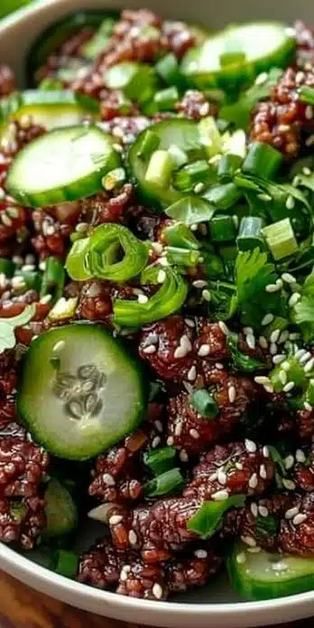 Spicy Keto Korean Beef served with fresh Cucumber Salad