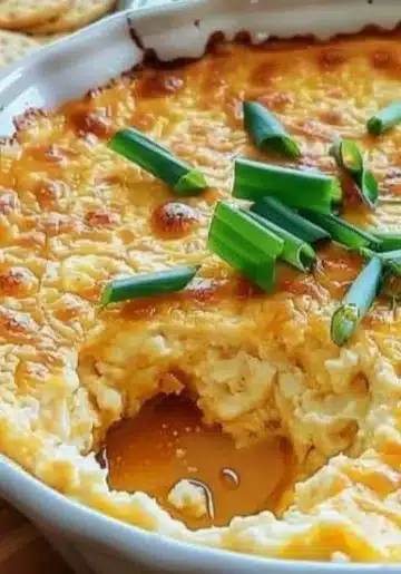 Hot honey cream cheese dip served with fresh vegetables and crackers